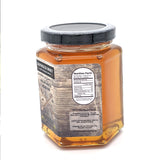 Shipwreck Honey Raw Honey 9oz hex jars in signature Wildflower Blossom Honey Side Label Nutritional Facts