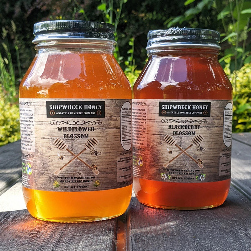 Shipwreck Honey Raw Honey 1 Quart Jars in Wildflower Blossom Honey (left) Blackberry Blossom Honey (right) from our hives to your home. 